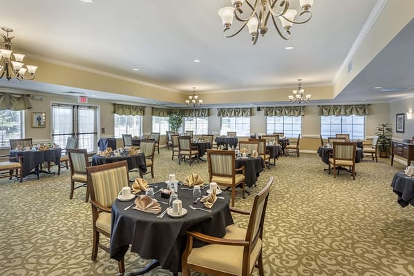 Dining room set up for a meal in the facility