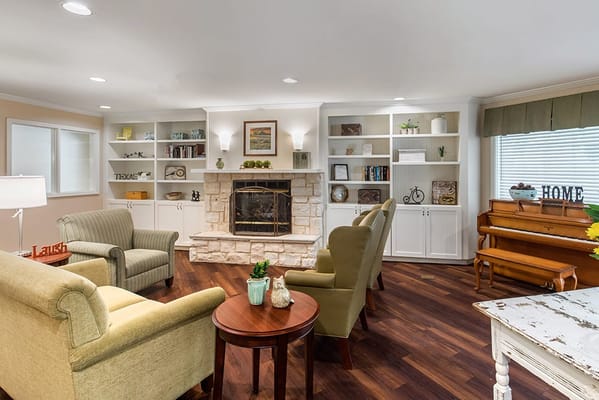 Cozy common area with seating and a fireplace
