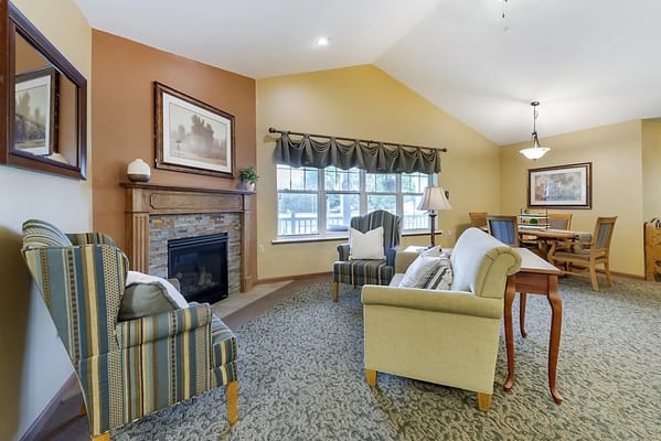 Cozy common area with seating and fireplace