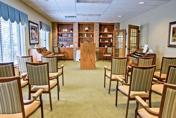 Bright common area with chairs arranged for an event