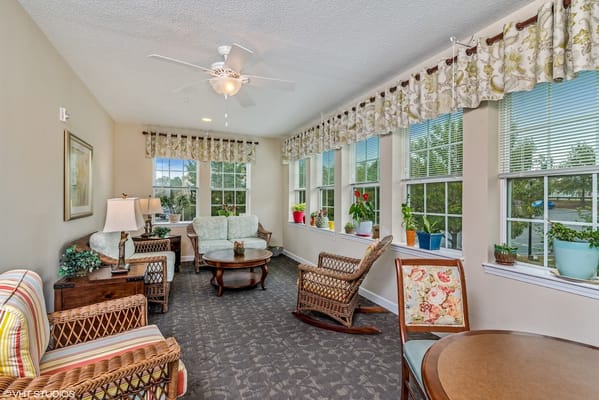 Bright common area with seating and plants