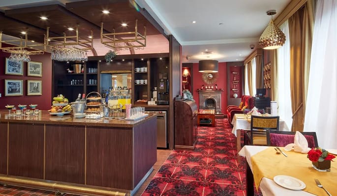 Interior view of a dining area with a bar and table setup