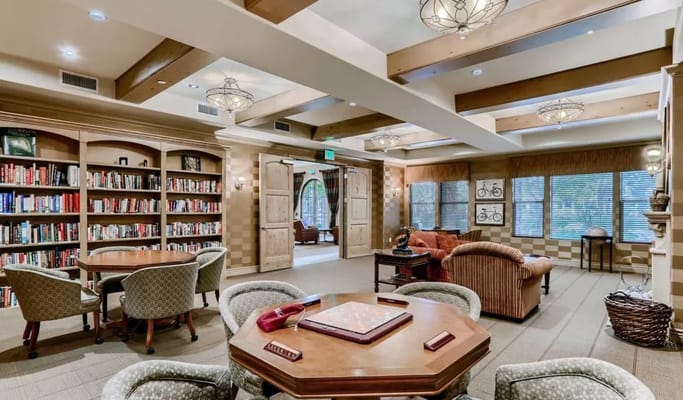 Common area with bookshelves and seating