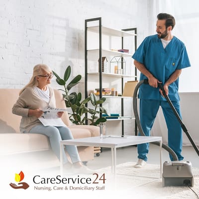 Staff member cleaning while a resident observes