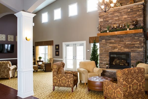 Cozy common area with seating and fireplace