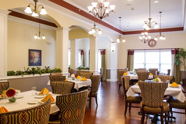 Bright dining room with tables and elegant decor