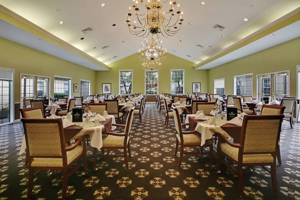 Dining area with tables set for a meal