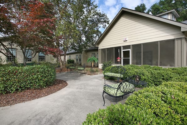 Garden patio with seating area outside facility