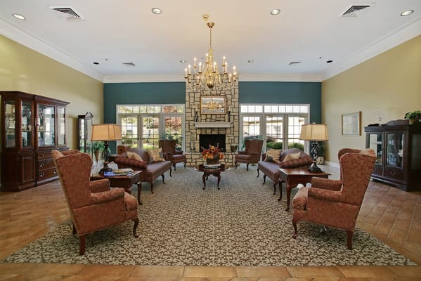 Cozy lounge area with comfortable seating and a fireplace