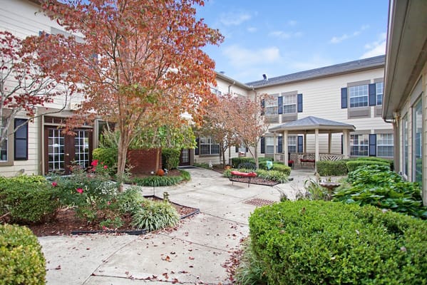 Outdoor courtyard with landscaping and a gazebo