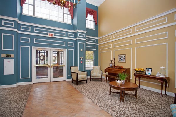 Interior view of a bright lobby with seating