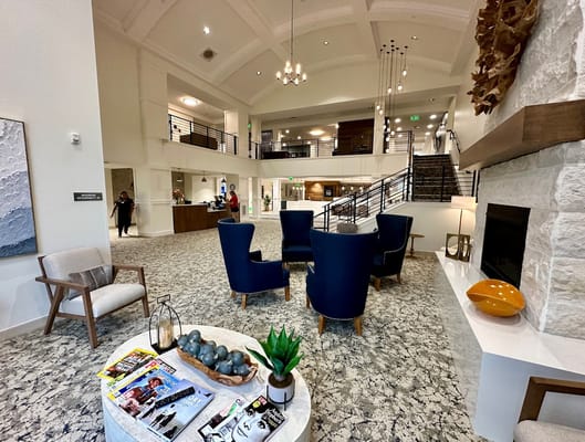 Bright lobby area with seating and decor
