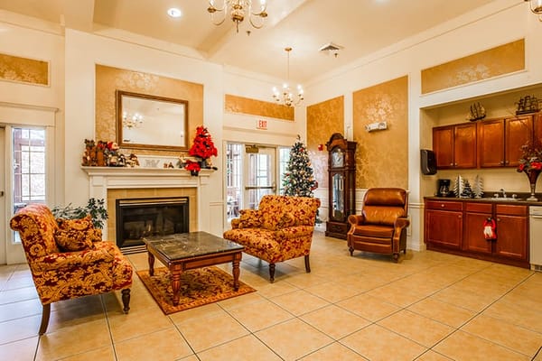 Cozy common area with festive decorations and seating