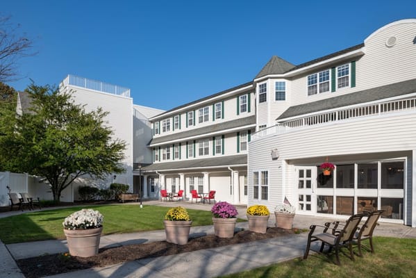 Exterior view of the facility courtyard with flowers