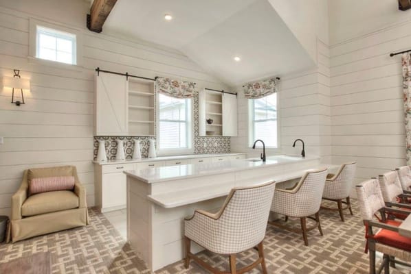 Bright and spacious kitchen with seating and windows