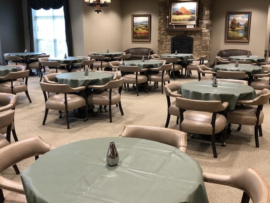 Dining room with tables and chairs set up