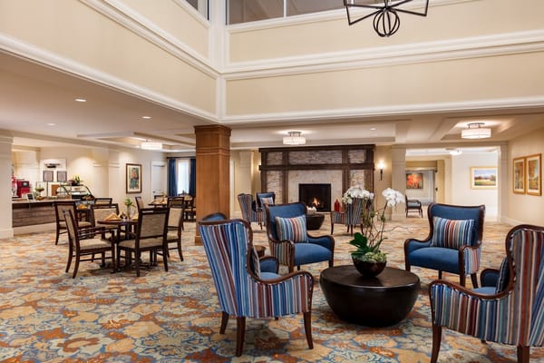 Bright, spacious common area with comfortable seating