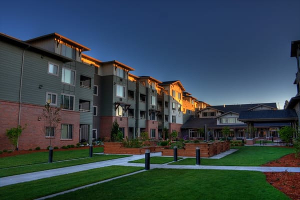Building exterior with landscaped gardens