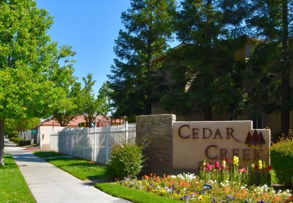 Exterior view of Cedar Creek facility with landscaping