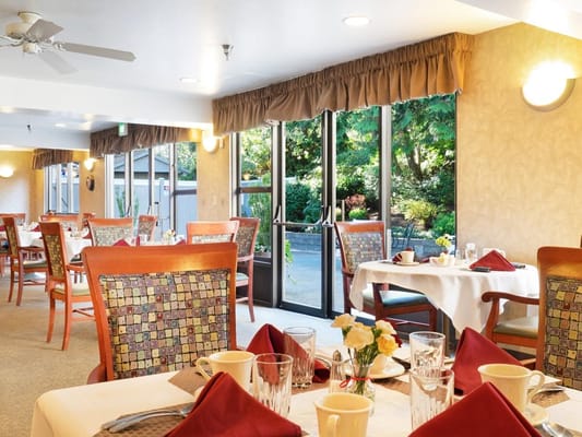 Dining area with tables and views of the garden