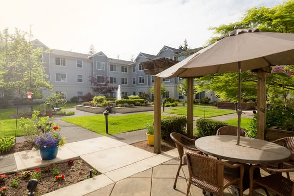 Outdoor courtyard with seating and a fountain