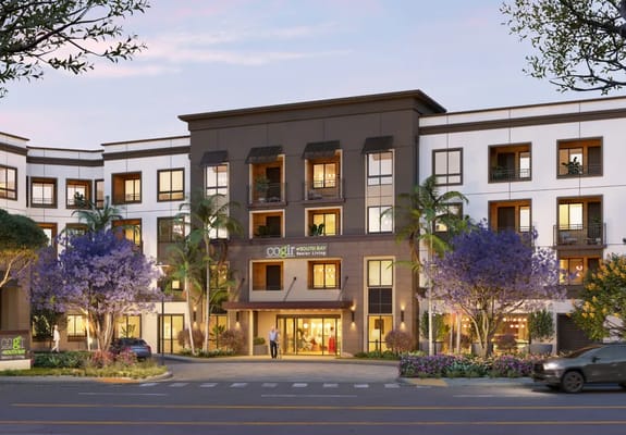 Exterior view of Cogir of South Bay facility with flowers