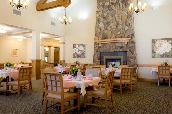 Dining room with tables set for a meal