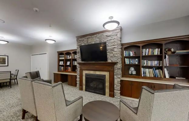 Cozy common area with a fireplace and comfortable seating