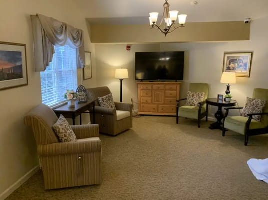 Cozy common area with seating and a television