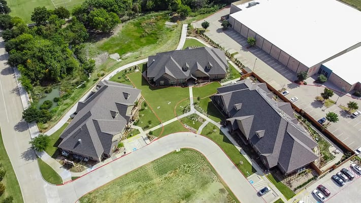 Aerial view of the assisted living facility buildings and grounds