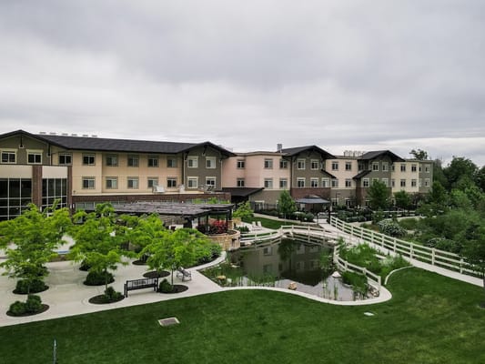 Exterior view of Creekside Assisted Living facility and gardens