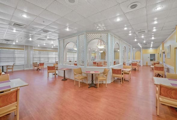 Interior view of a dining area with chairs and tables