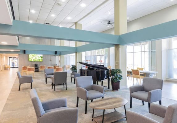 Bright and spacious interior common area with seating