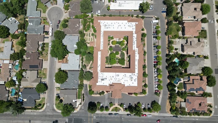 Aerial view of the Oakmont of Carmichael facility with surrounding landscaping