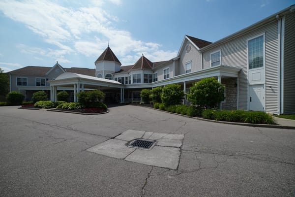 Exterior view of Brookdale Kenwood with gardens