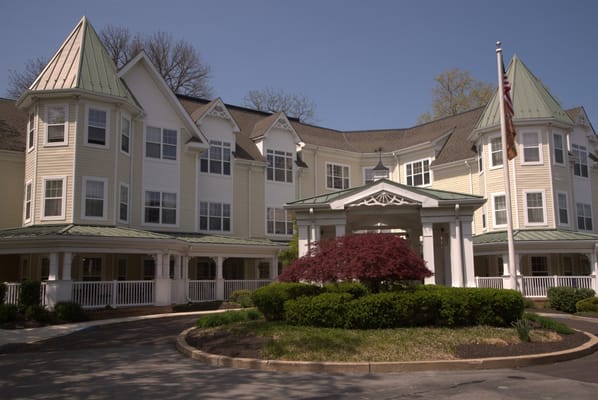 Front entrance of Sunrise of Haverford with landscaped gardens