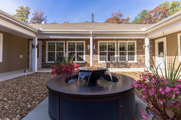 Beautiful outdoor courtyard with fountain and flowers