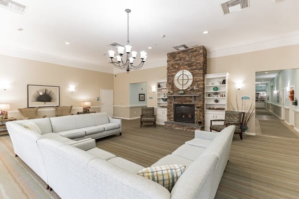 Interior lounge area with seating and fireplace