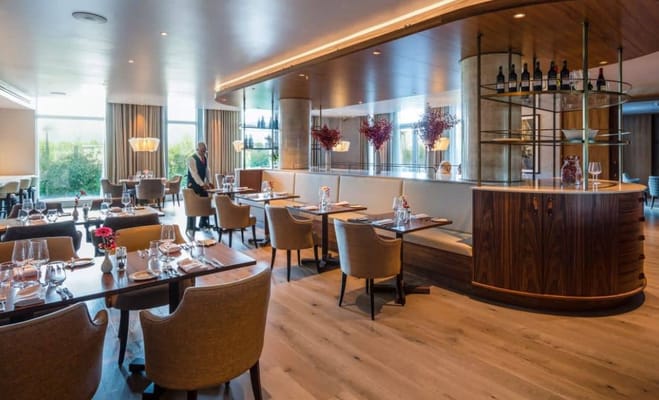 Elegant dining room with well-set tables