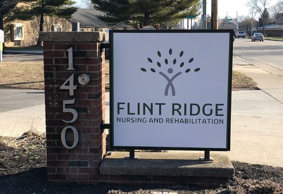 Facility logo displayed on a sign