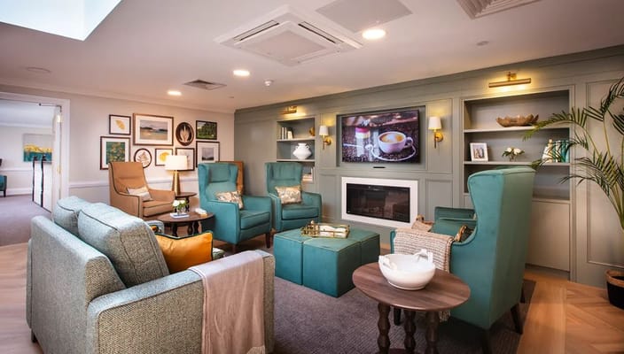 Cozy common area with comfortable seating and a television