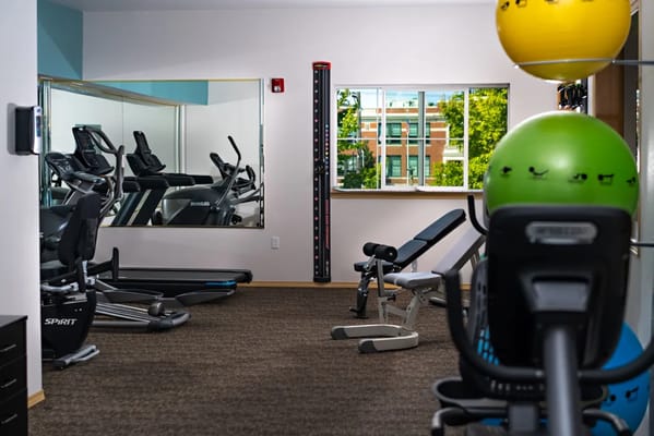 Interior view of a fitness area with exercise equipment