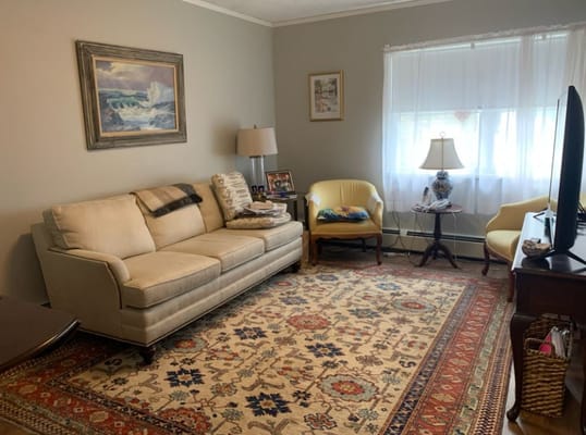 Cozy living area with a sofa and window light