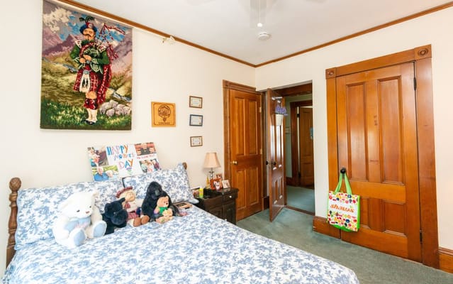 A cozy resident room decorated with personal items