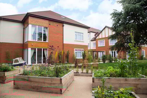 Garden area with raised beds and seating.