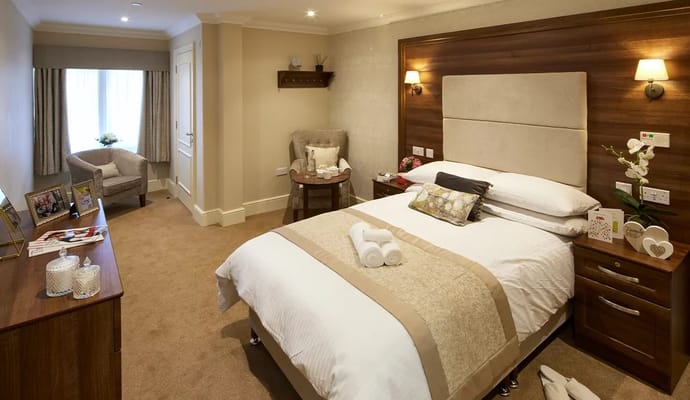 A well-furnished bedroom in Hampstead Court Care Home