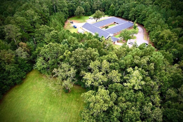 Aerial view of Haven Memory Care facility among greenery