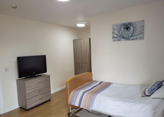 Private resident room with a bed and furniture