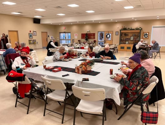 Residents enjoying a meal in the dining room