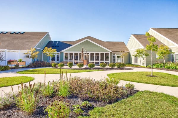 View of the front entrance with landscaped garden at Landings of Sidney